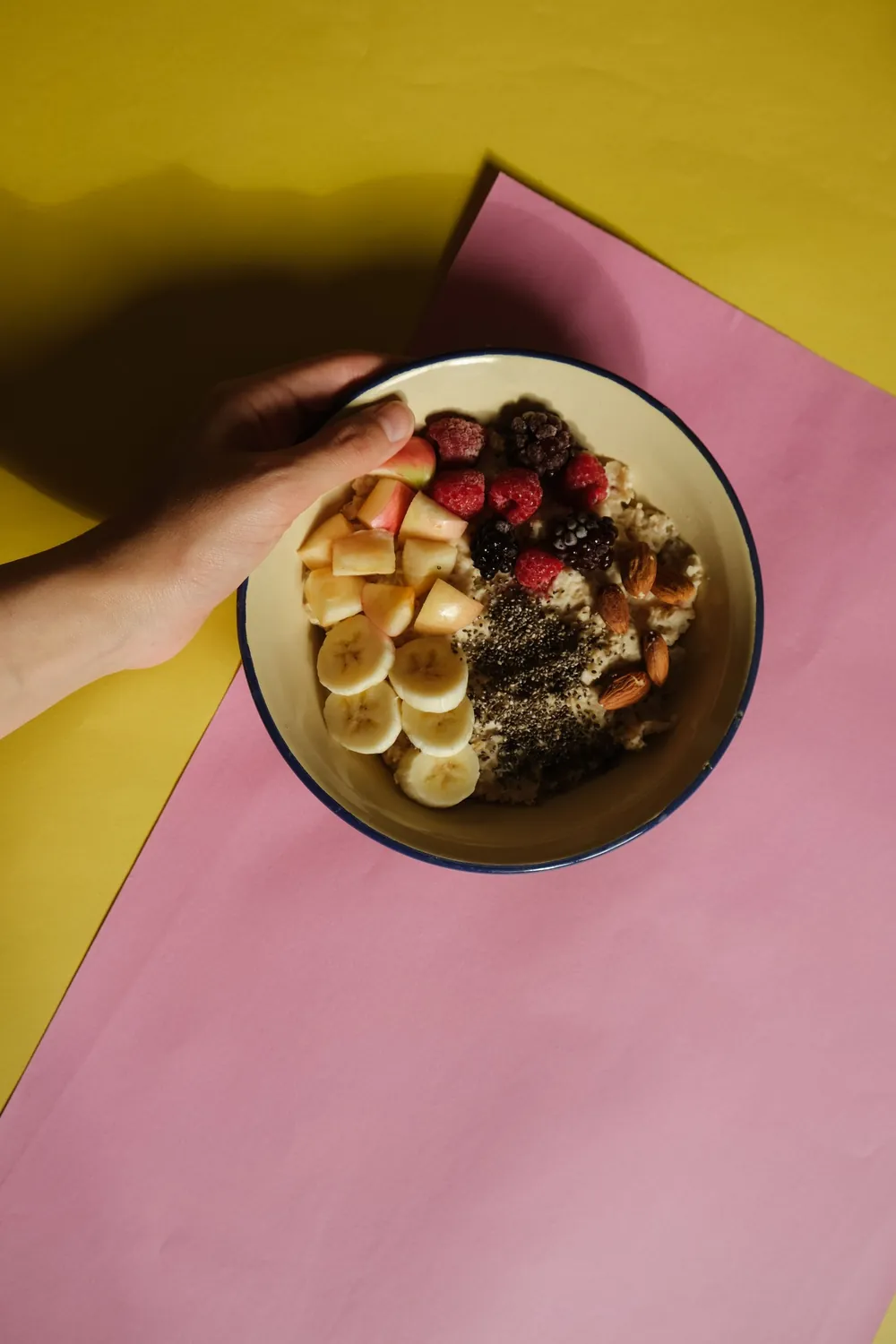 Bowl of fresh fruit and nuts, representing metabolic health