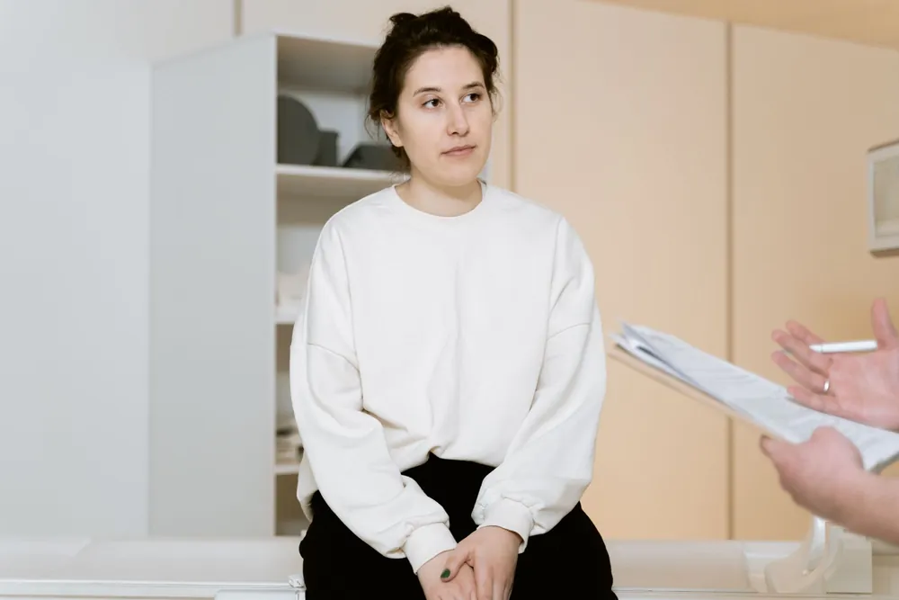 Woman during a medical consultation, representing women's health care